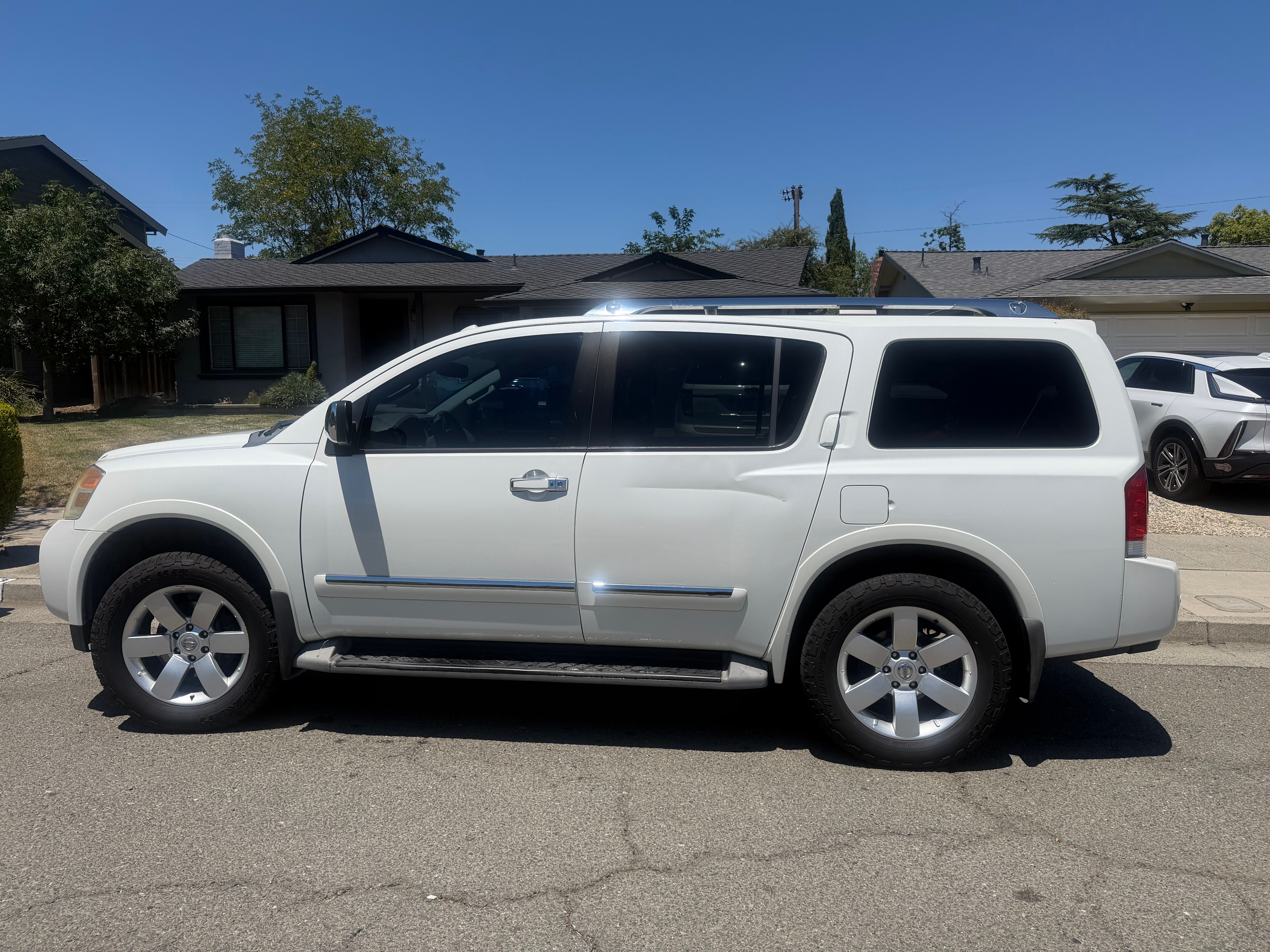 Used 2013 Nissan Armada SL AWD/4WD image 1