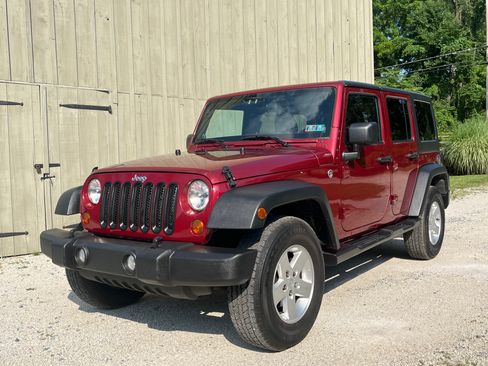 Used 2012 Jeep Wrangler Unlimited Sport AWD/4WD image 1