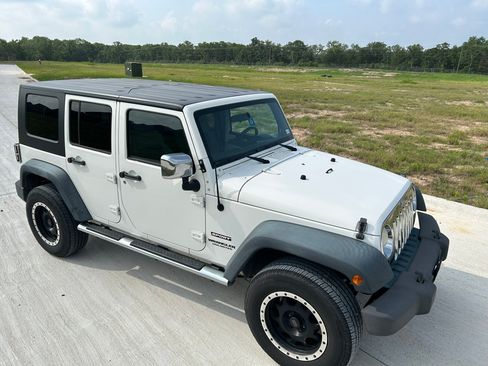 Used 2010 Jeep Wrangler Unlimited Sport AWD/4WD image 1
