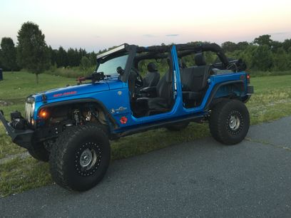 Used 2014 Jeep Wrangler Unlimited Sport