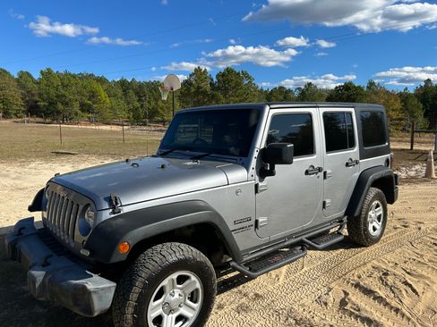 Used 2016 Jeep Wrangler Unlimited Sport image 1