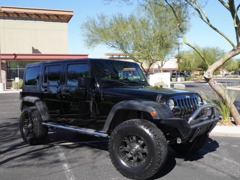 Used 2013 Jeep Wrangler Unlimited Sport image 1