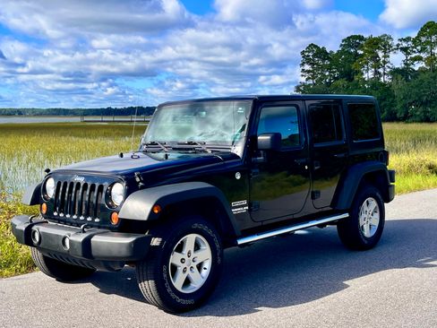 Used 2013 Jeep Wrangler Unlimited Sport image 1