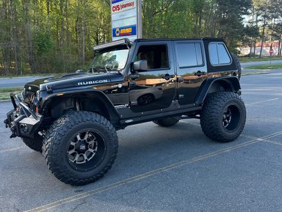 Used 2012 Jeep Wrangler Unlimited Rubicon w/ Dual Top Group