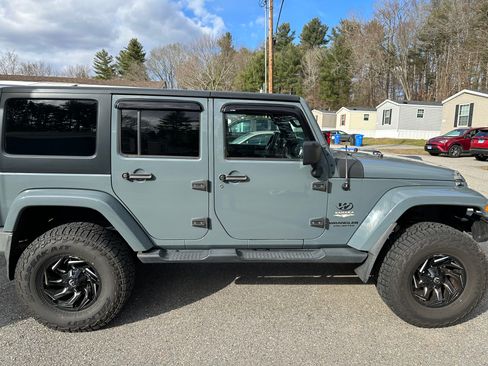 Used 2014 Jeep Wrangler Unlimited Sahara w/ Dual Top Group image 1