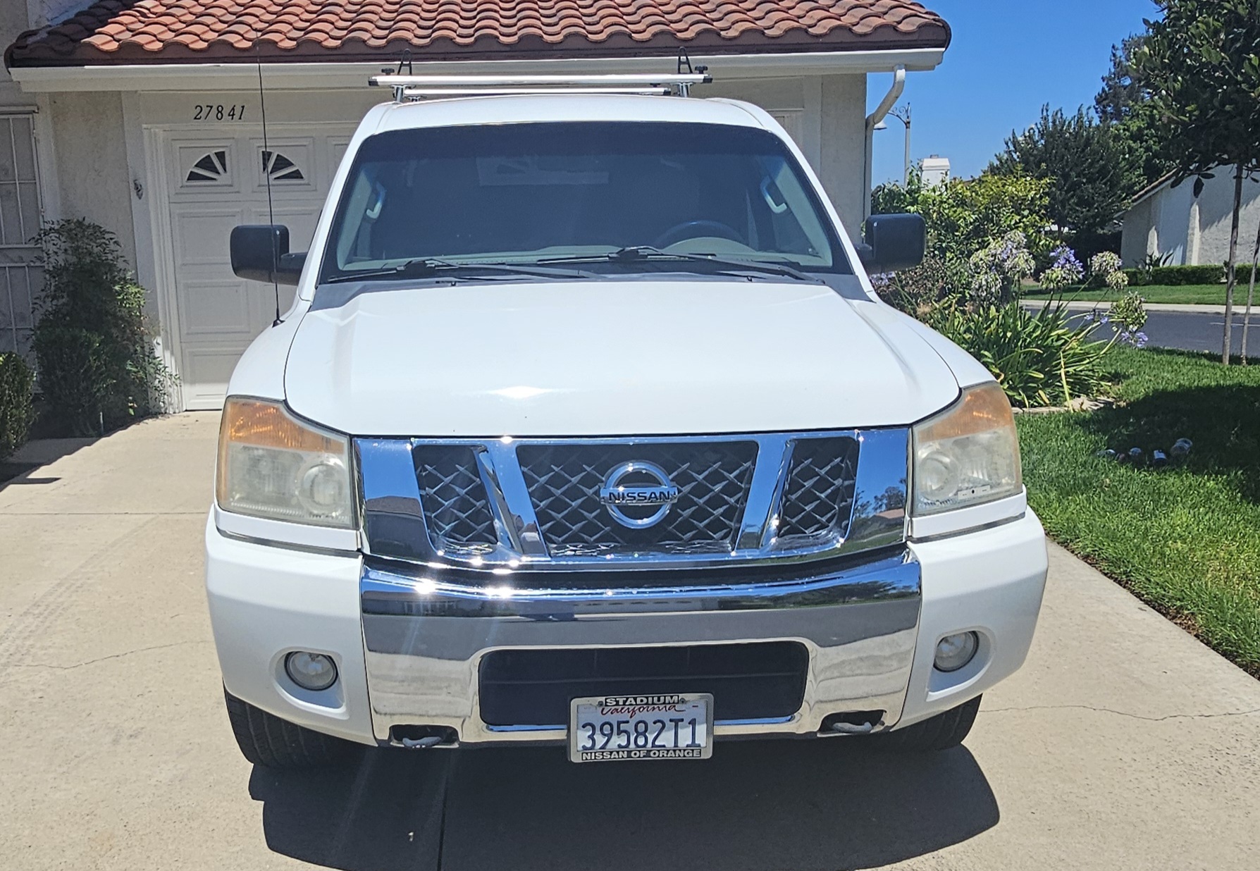Used 2012 Nissan Titan SV w/ SV Value Truck Pkg AWD/4WD image 2