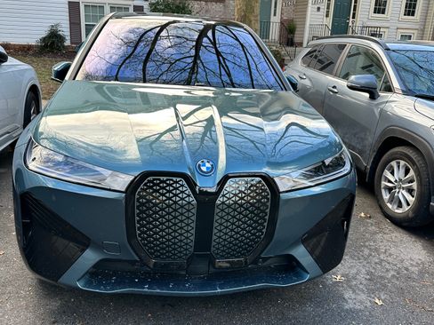 Used 2025 BMW iX xDrive50 w/ Sport Package image 1