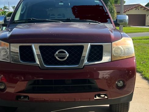 Used 2011 Nissan Armada Platinum w/ 2nd Row Captain Seat Pkg image 2