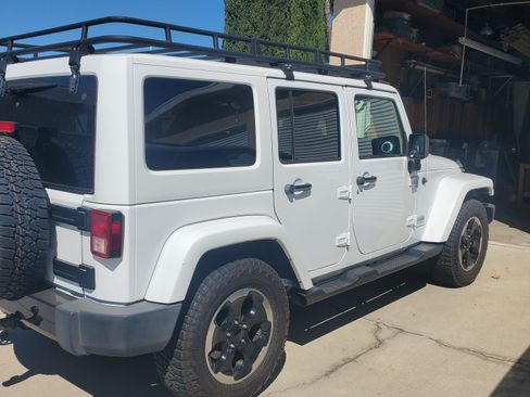 Used 2014 Jeep Wrangler Unlimited Sahara image 1