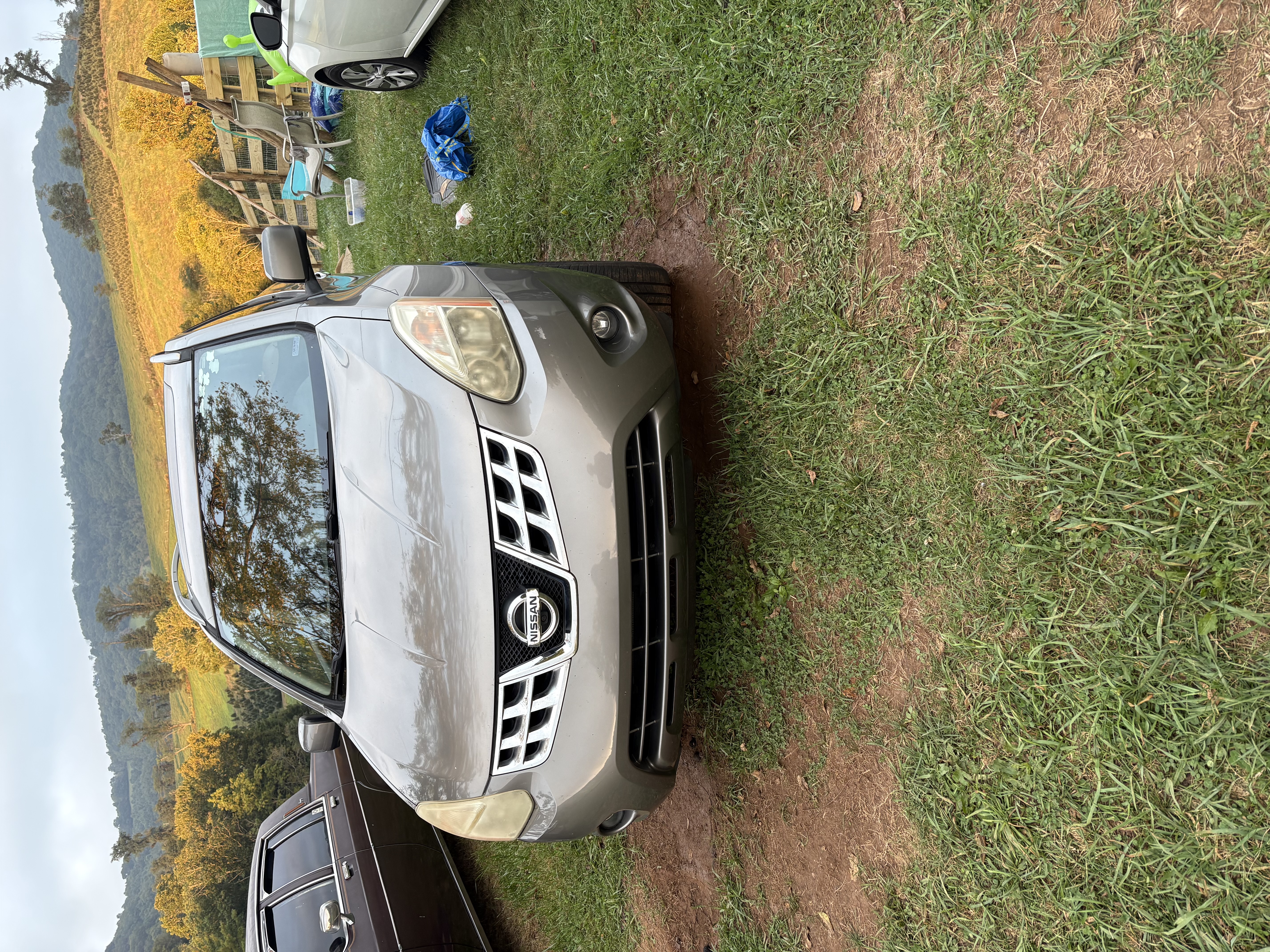 Used 2012 Nissan Rogue SL AWD/4WD image 1