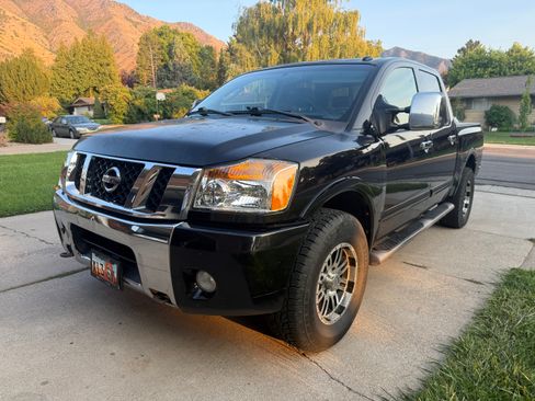 Used 2011 Nissan Titan SL w/ SL Technology Pkg AWD/4WD image 1
