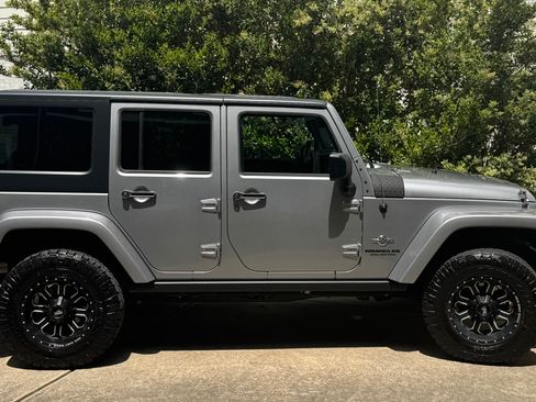 Used 2014 Jeep Wrangler Unlimited Sport AWD/4WD image 1