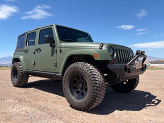 Used 2011 Jeep Wrangler Unlimited Sahara w/ Connectivity Group AWD/4WD video 1