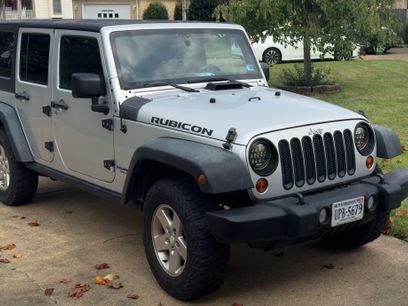 Used 2011 Jeep Wrangler Unlimited Rubicon w/ Dual Top Group