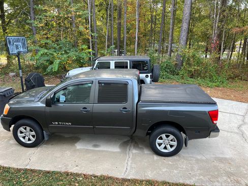 Used 2011 Nissan Titan SV w/ SV Premium Utility Pkg AWD/4WD image 1