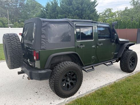 Used 2007 Jeep Wrangler Unlimited Rubicon w/ Dual Top Group AWD/4WD image 5