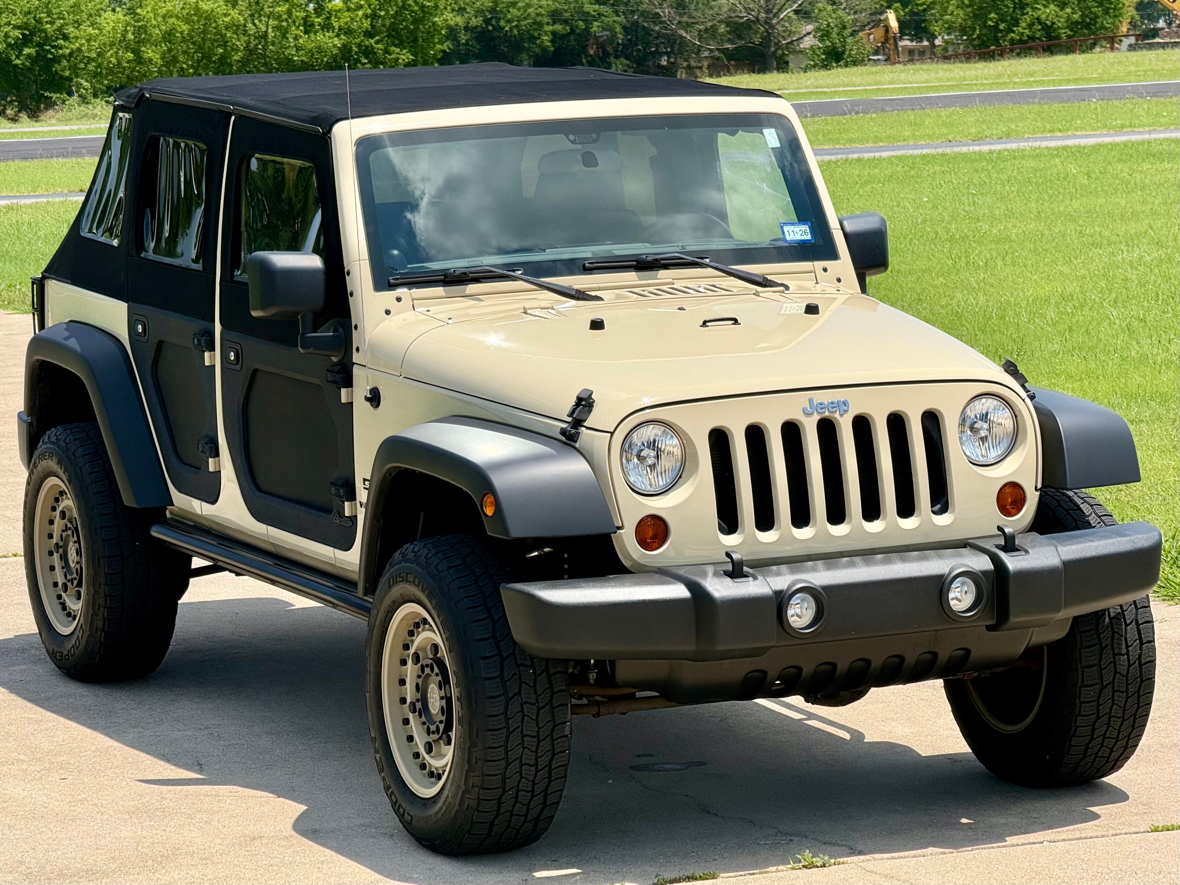 Used 2012 Jeep Wrangler Unlimited Sport AWD/4WD image 1