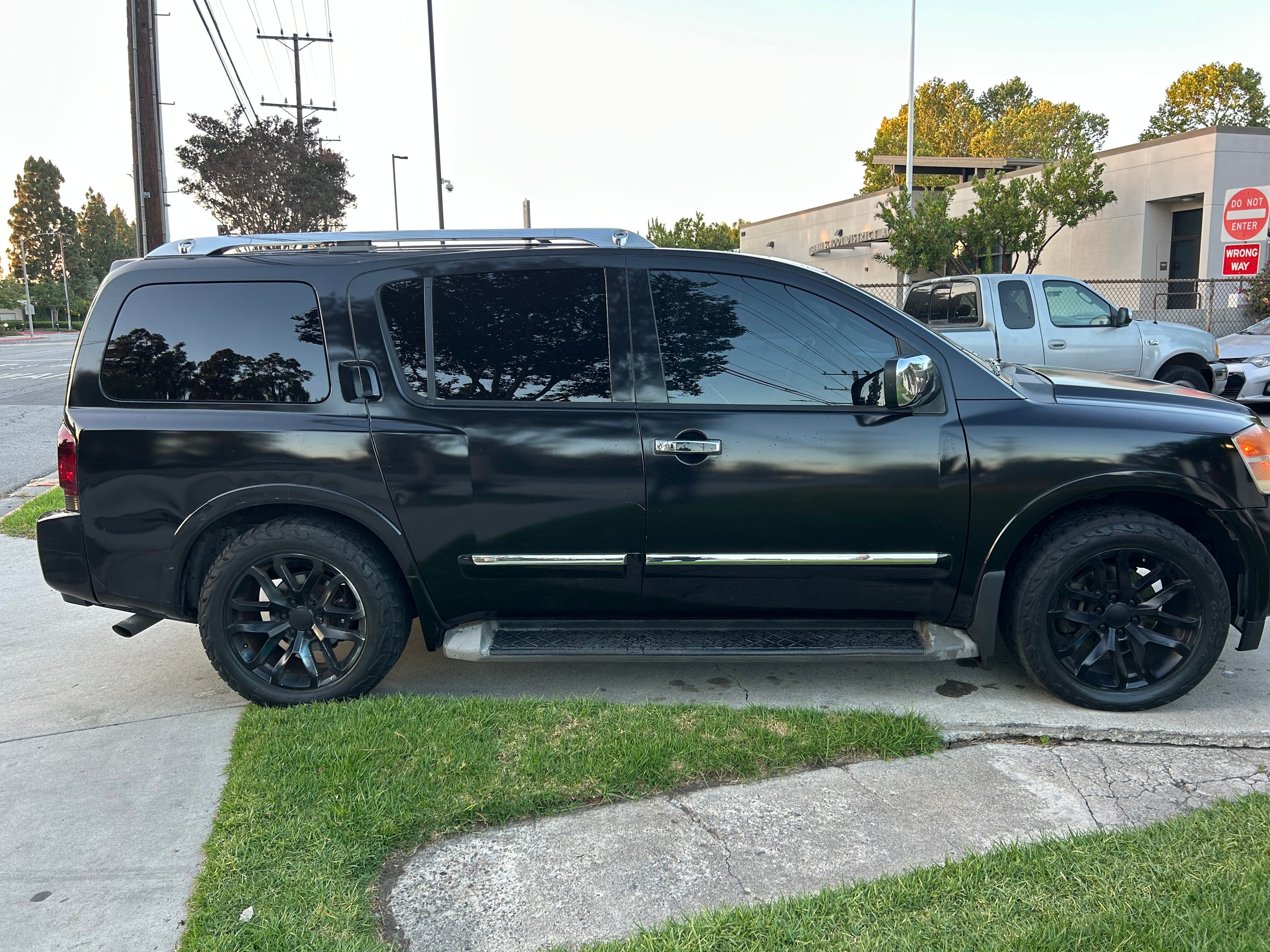 Used 2010 Nissan Armada Platinum w/ Captain Seat Pkg RWD image 1