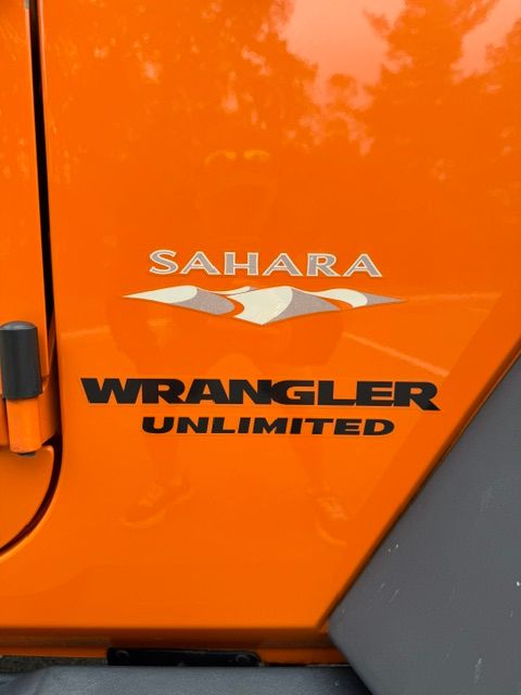 Used 2012 Jeep Wrangler Unlimited Sahara w/ Dual Top Group AWD/4WD image 12
