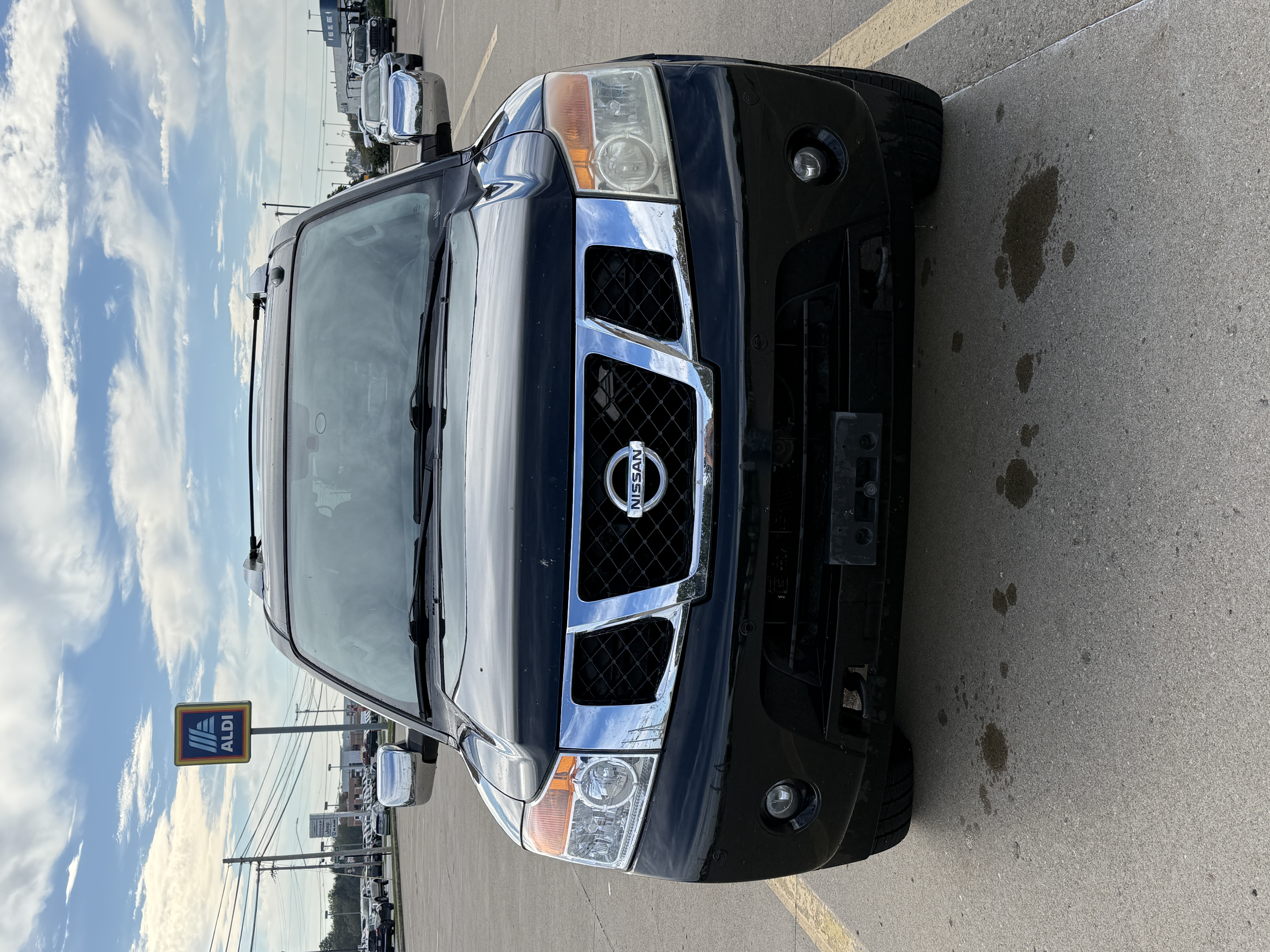 Used 2015 Nissan Armada Platinum w/ 2nd Row Captain Seat Package AWD/4WD image 1
