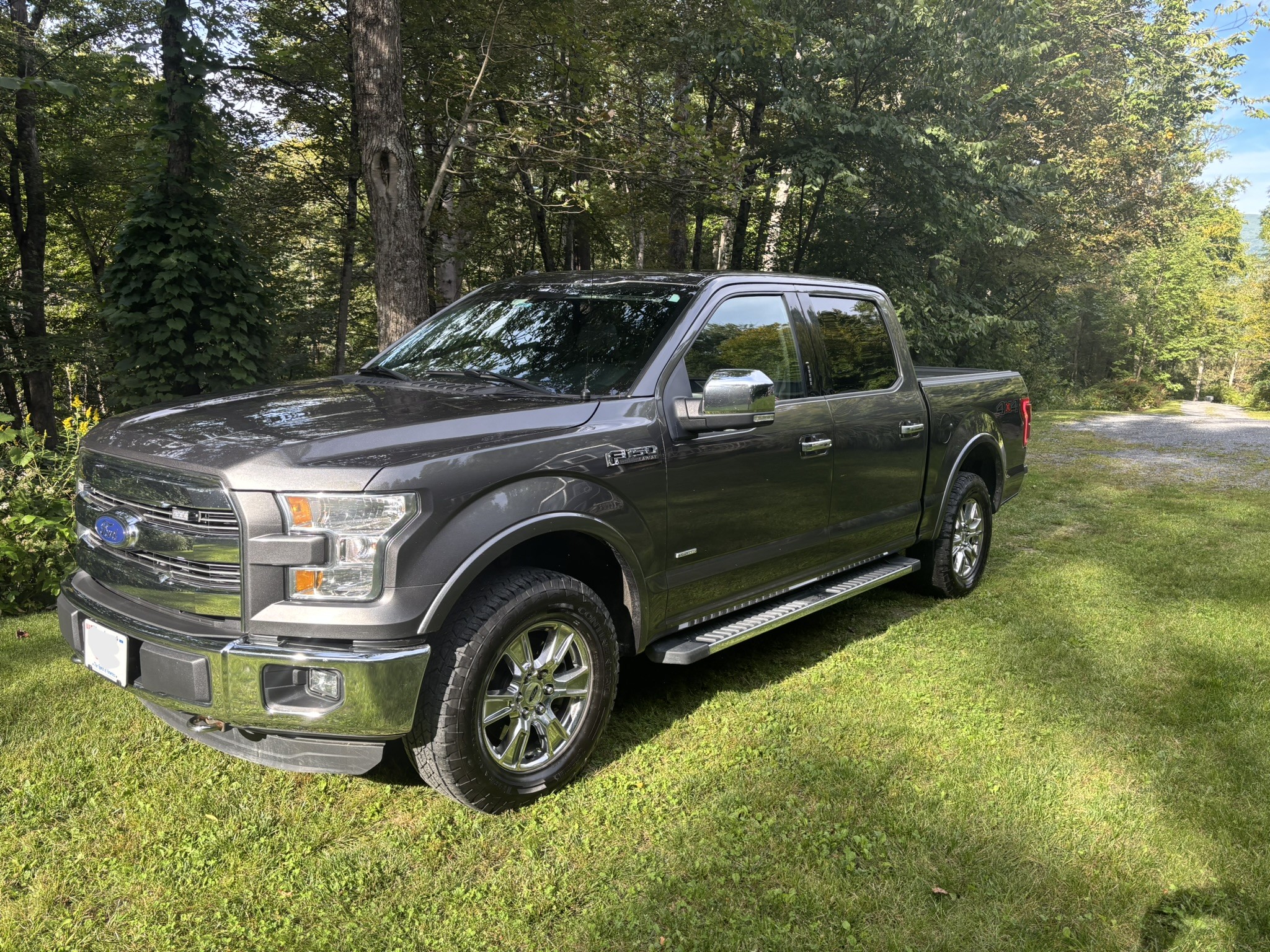 Used 2015 Ford F150 Lariat AWD/4WD image 1
