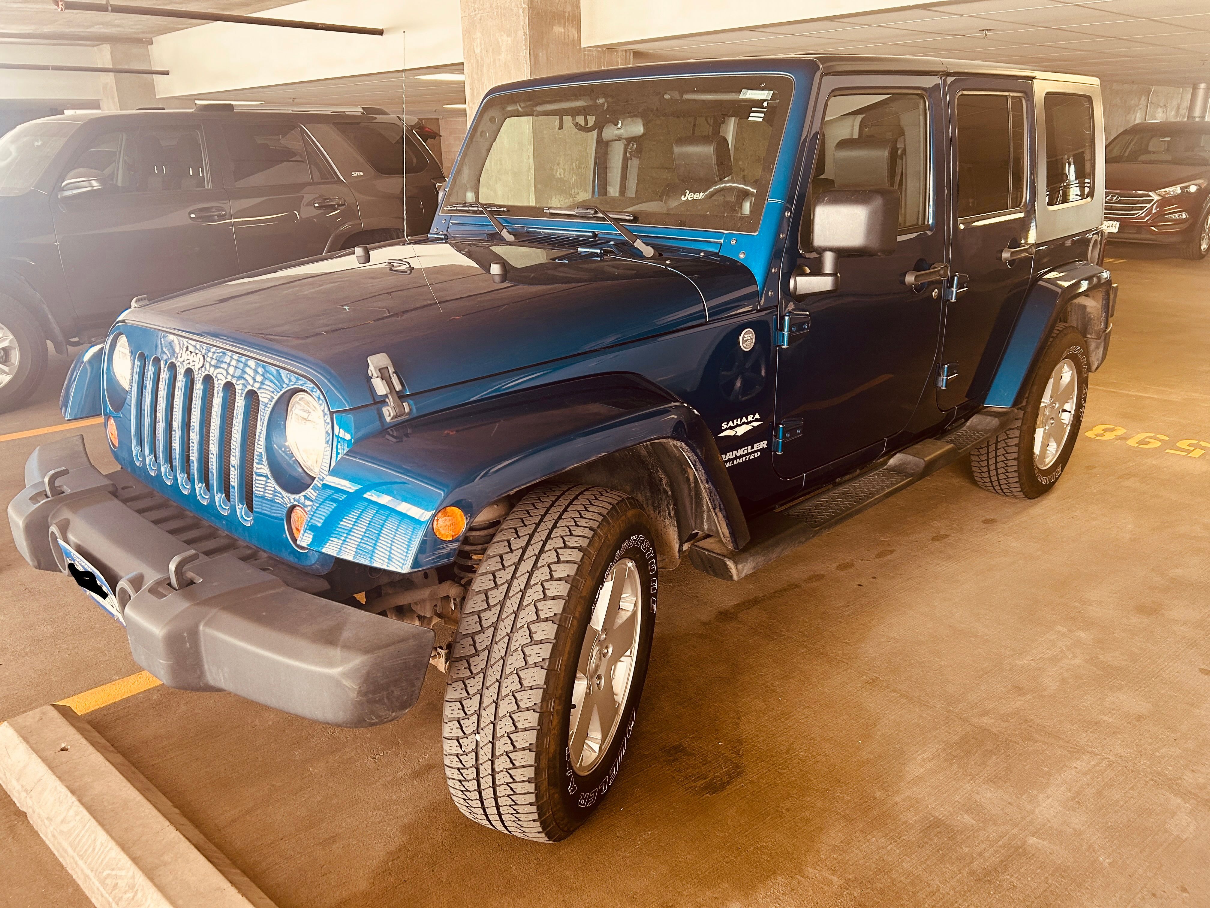 Used 2010 Jeep Wrangler Unlimited Sahara w/ Dual Top Group AWD/4WD image 1