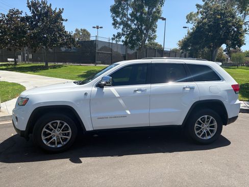 Used 2014 Jeep Grand Cherokee Limited w/ Luxury Group II AWD/4WD image 1