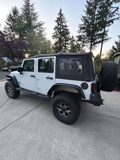 Used 2013 Jeep Wrangler Unlimited Sport w/ Connectivity Group AWD/4WD image 4