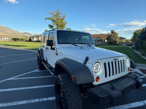 Used 2010 Jeep Wrangler Unlimited Sport AWD/4WD image 1