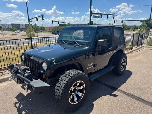 Used 2012 Jeep Wrangler Sahara w/ Dual Top Group AWD/4WD image 1