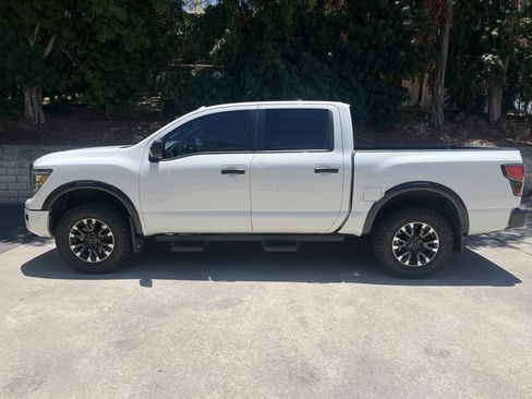 Used 2021 Nissan Titan PRO-4X w/ Off Road Protection Package AWD/4WD image 1