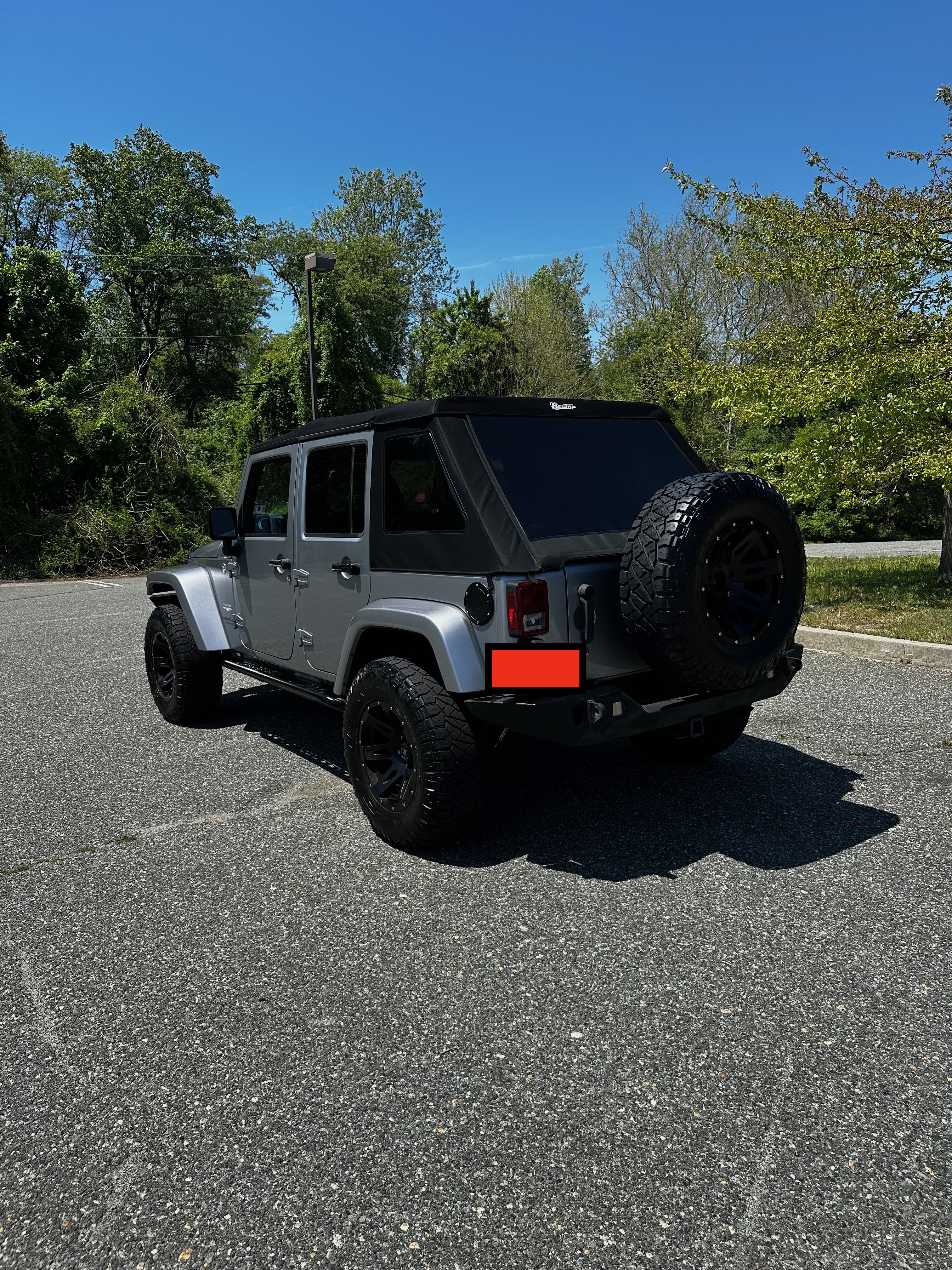 Used 2015 Jeep Wrangler Unlimited Sahara w/ Dual Top Group AWD/4WD image 4