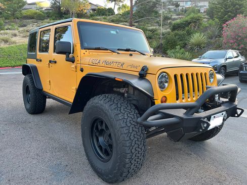Used 2012 Jeep Wrangler Unlimited Sport w/ Black Appearance Group AWD/4WD image 6