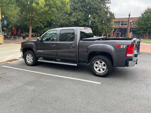 Used 2011 GMC Sierra 1500 SLT w/ Suspension Package, Off-Road image 1