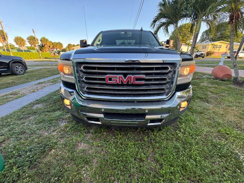 Used 2015 GMC Sierra 2500 SLT w/ Duramax Plus Package AWD/4WD image 1