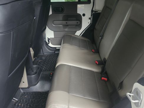 Used 2010 Jeep Wrangler Unlimited Sahara w/ Dual Top Group AWD/4WD image 9