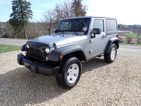 Used 2015 Jeep Wrangler Sport image 1