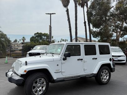 Used 2015 Jeep Wrangler Unlimited Sahara w/ Dual Top Group