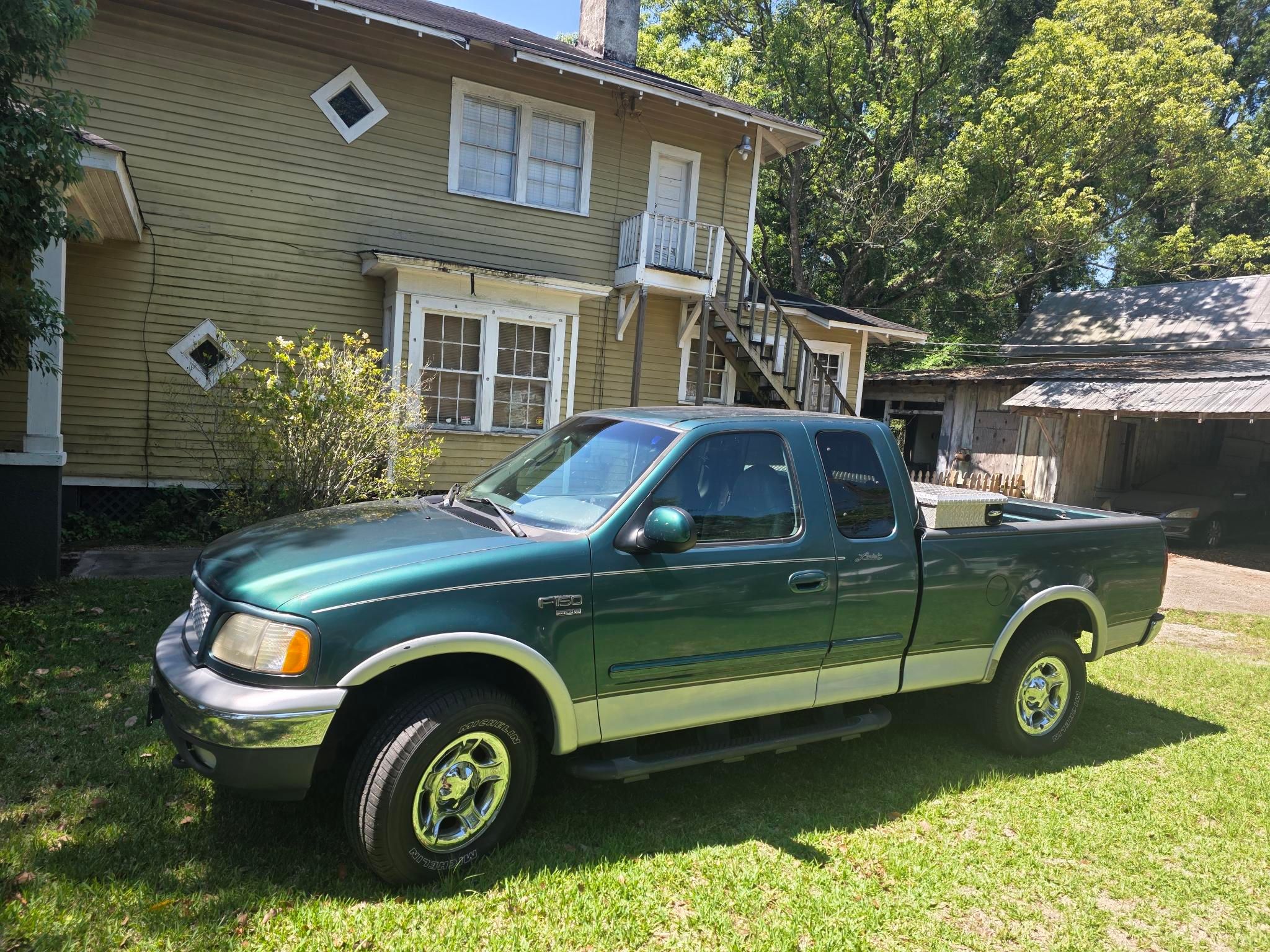 Used 1999 Ford F150 4x4 SuperCab image 1