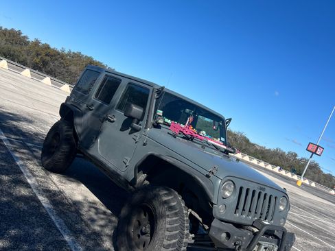 Used 2014 Jeep Wrangler Unlimited Sahara w/ Max Tow Package image 2