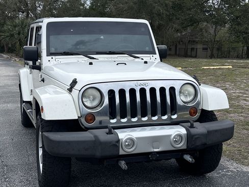 Used 2010 Jeep Wrangler Unlimited Sahara w/ Mopar Chrome Edition Group image 1