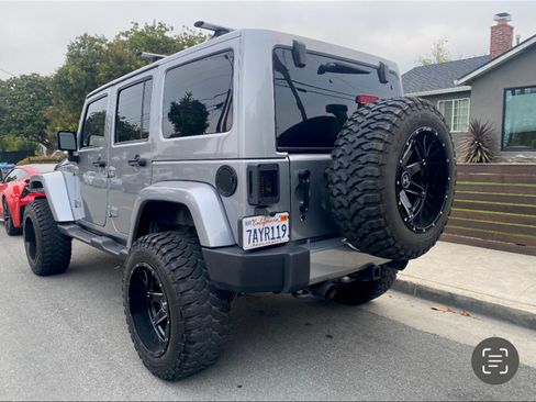 Used 2013 Jeep Wrangler Unlimited Sahara w/ Max Tow Pkg image 2