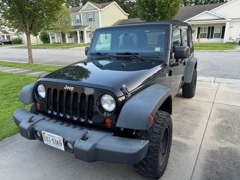 Used 2013 Jeep Wrangler Unlimited Sport image 1