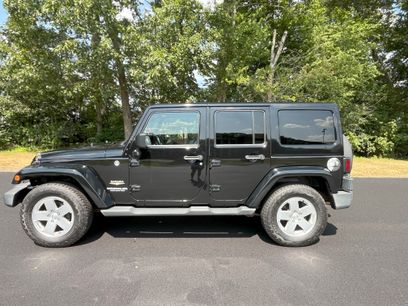 Used 2012 Jeep Wrangler Unlimited Sahara w/ Dual Top Group