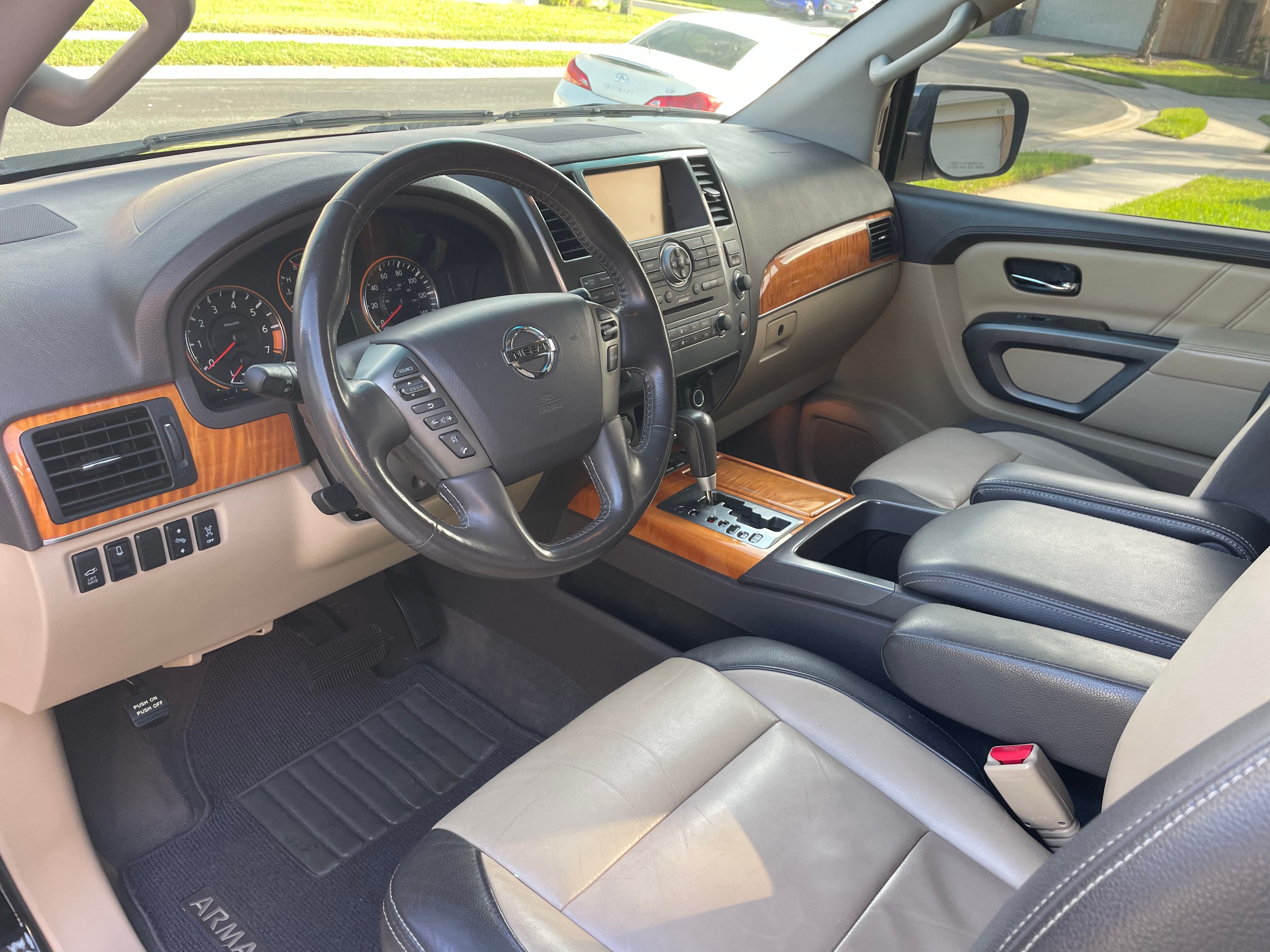 Used 2015 Nissan Armada Platinum AWD/4WD image 1