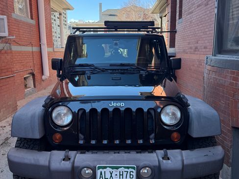 Used 2012 Jeep Wrangler Unlimited Sport image 2