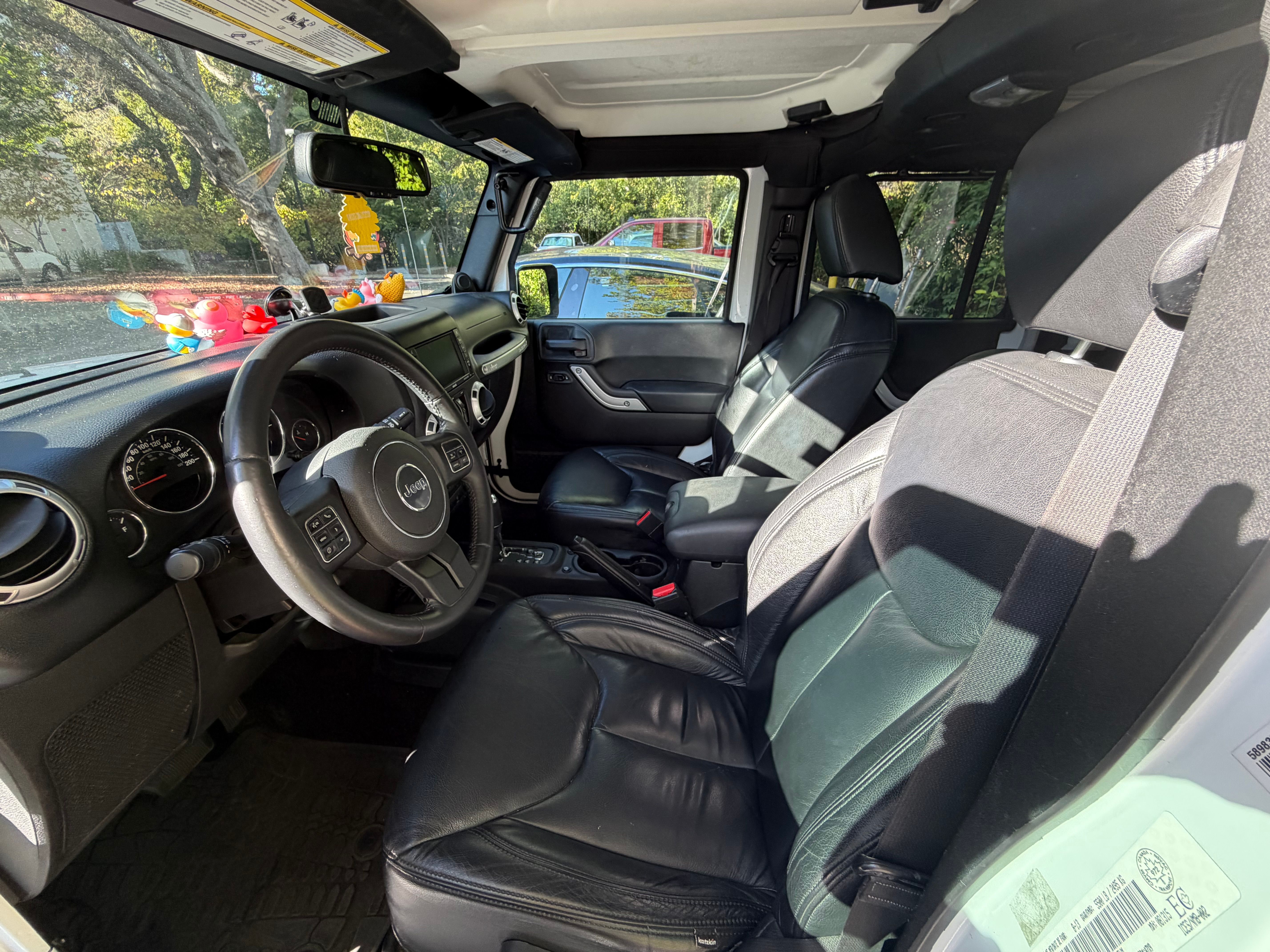 Used 2014 Jeep Wrangler Unlimited Sahara w/ Dual Top Group AWD/4WD image 11