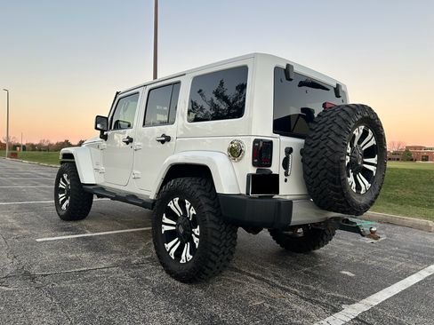 Used 2013 Jeep Wrangler Unlimited Sahara w/ Dual Top Group image 12