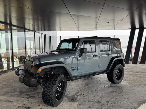 Used 2014 Jeep Wrangler Unlimited Sport image 1