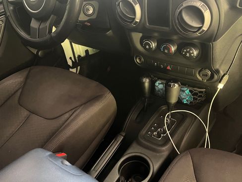 Used 2013 Jeep Wrangler Unlimited Sport w/ Mopar Black Appearance Group AWD/4WD image 5